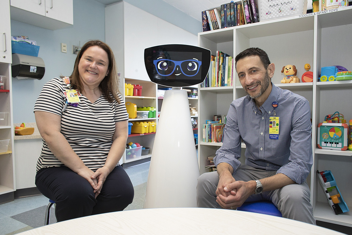 Staff and robin the robot