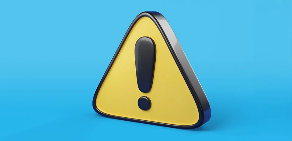 A yellow alert button with an exclamation point is pictured on a blue background.