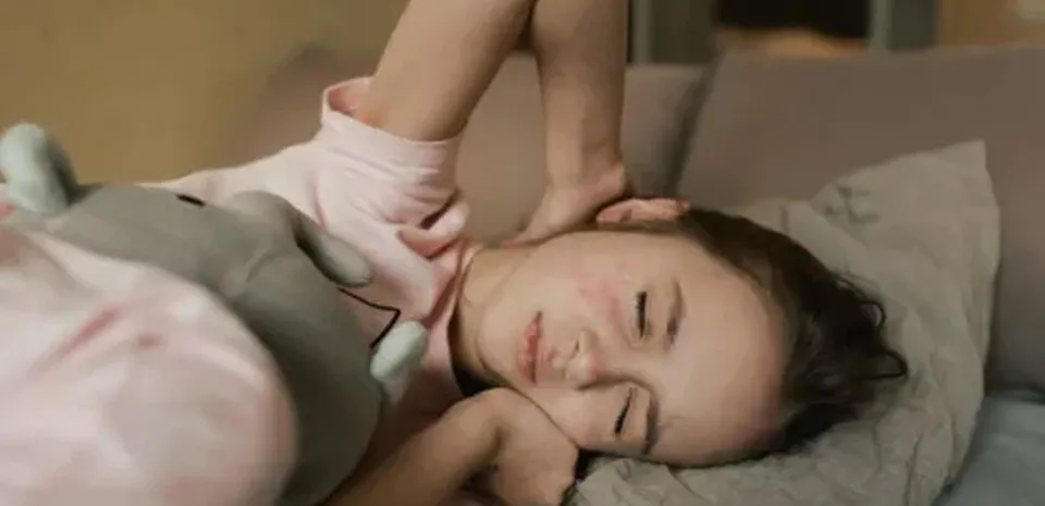 sick girl with the measles