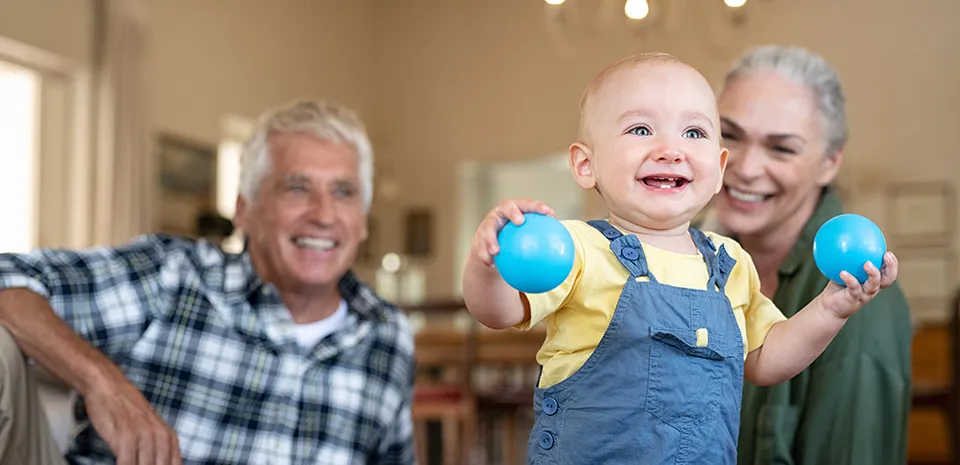 grandparents enjoying time with baby