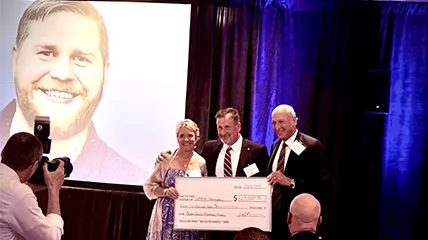 From left to right: Lisa Faust, Dr. James Faust and Edward Moore, CEO and president of UMass Memorial Health-Harrington Hospital, at a fundraiser in July 2025